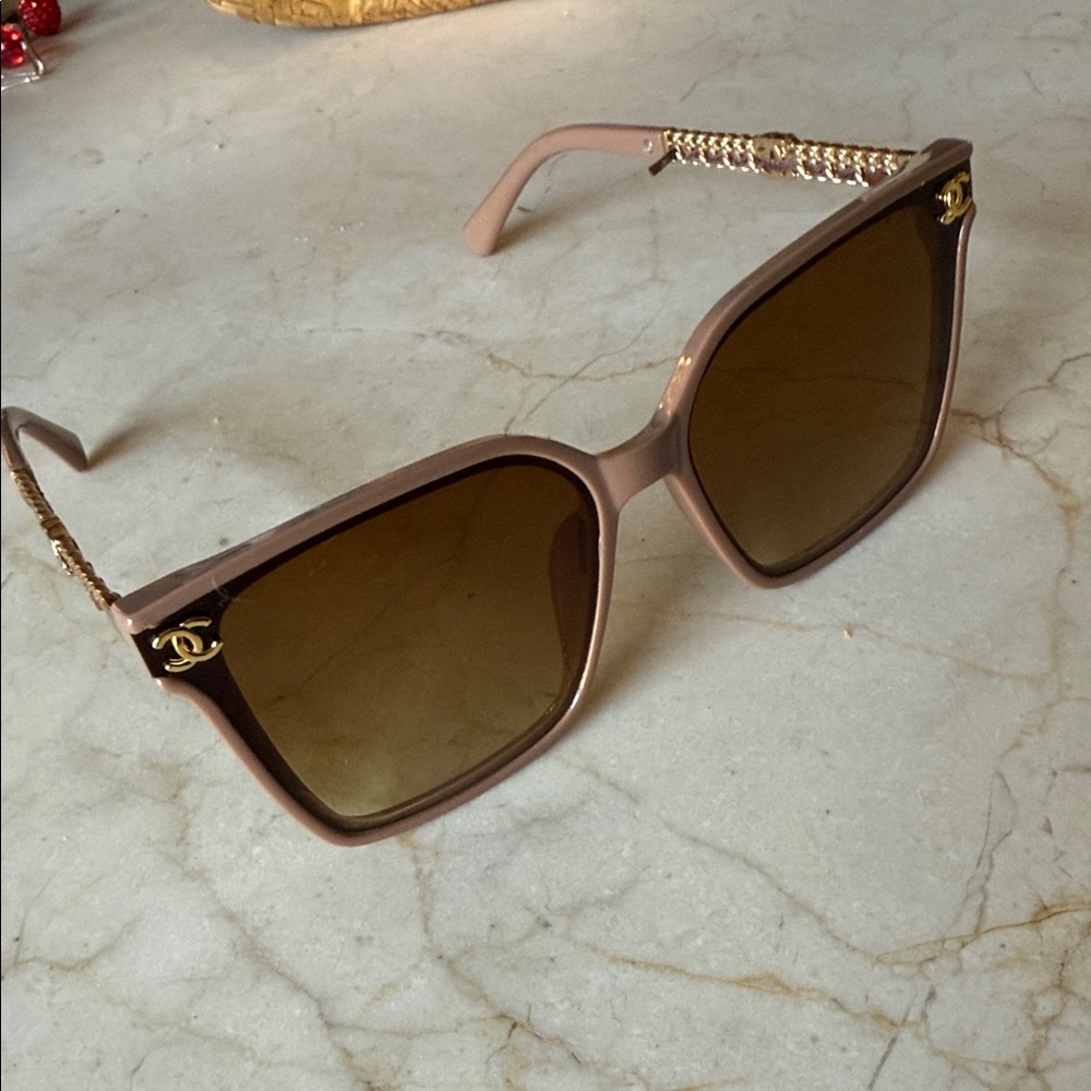 CHANEL Brown Sunglasses with Gold Detailing